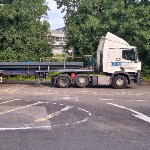 photo of a truck with an extended flatbed owned by Richard Tovey Transport Limited